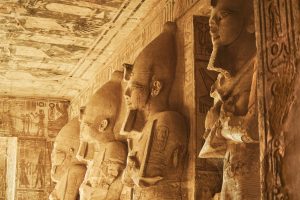 Sculptures from The Great Temple of Ramesses II in Abu Simbel. Osiris pillars in the Hypostyle Hall of the Great Temple of Ramesses II. Popular Egyptian landmarks. Ancient Egypt. Vacation destination. Historic site
